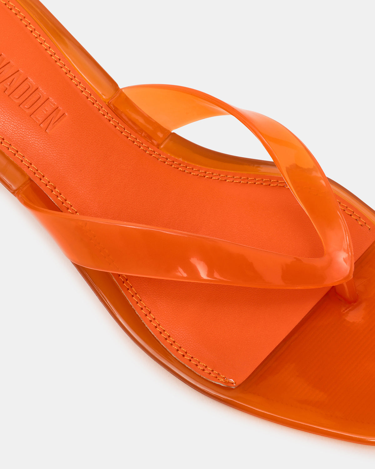 TRACIE Jelly Orange Thong Strap Women's Kitten Heel | Steve Madden Featured