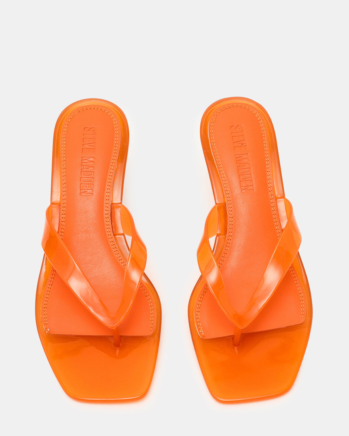 TRACIE Jelly Orange Thong Strap Women's Kitten Heel | Steve Madden Featured