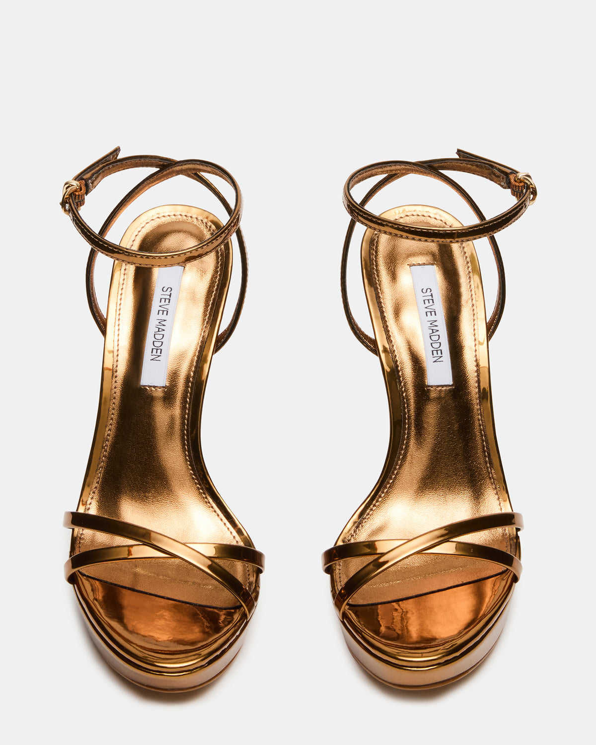 JUNI Bronze Criss Cross Stiletto Ankle Strap Women's Heel | Steve Madden Customer Favorite