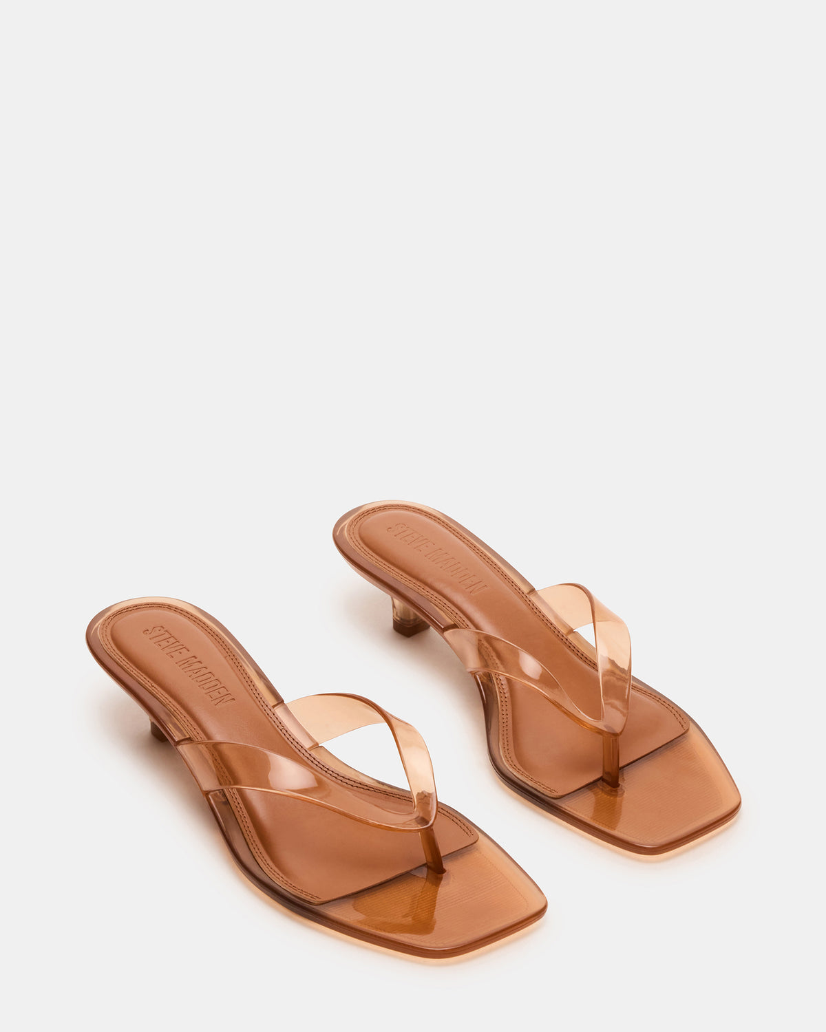 TRACIE Jelly Tan Thong Strap Women's Kitten Heel | Steve Madden Featured
