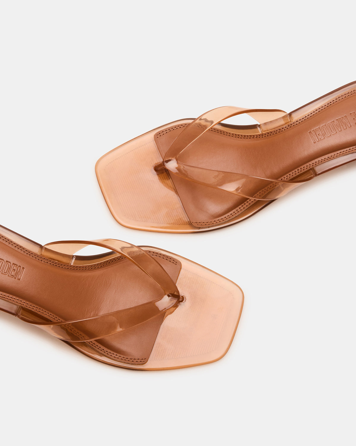 TRACIE Jelly Tan Thong Strap Women's Kitten Heel | Steve Madden Featured
