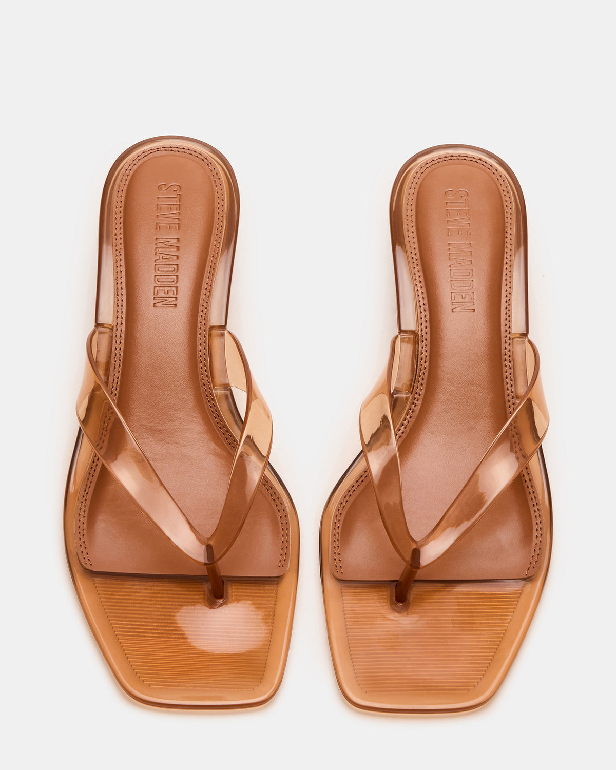 TRACIE Jelly Tan Thong Strap Women's Kitten Heel | Steve Madden Featured