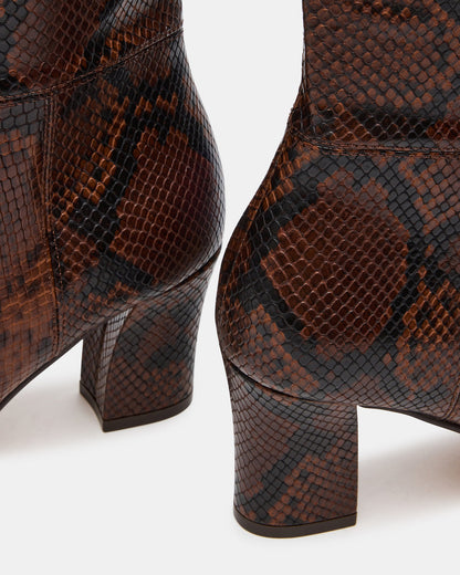 ELLIOT Brown Snake Square-Toe Knee-High Block Heel Women's Boot | Steve Madden Featured