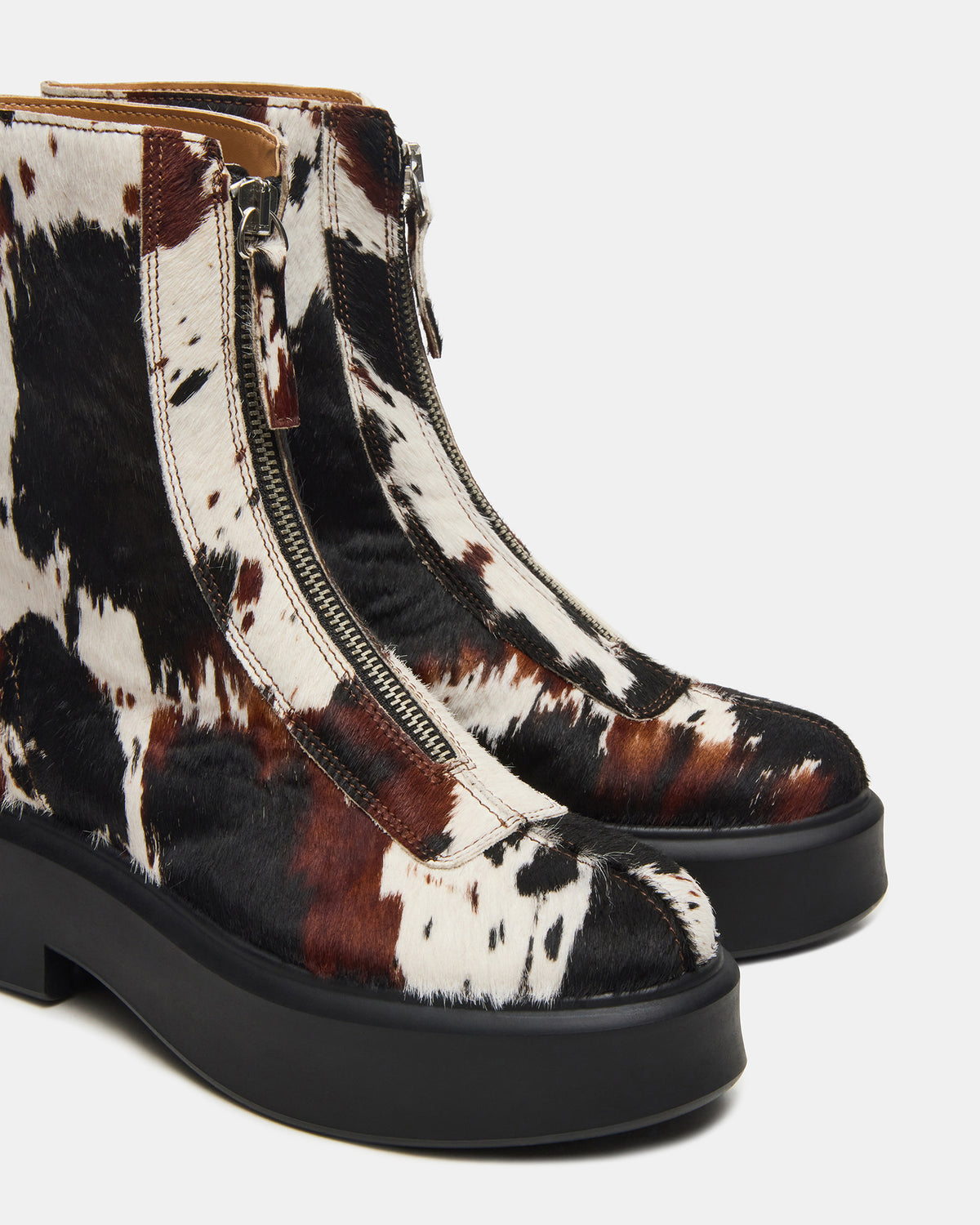 JONES Brown Cow Print Zipper Lug Women's Ankle Boot | Steve Madden New