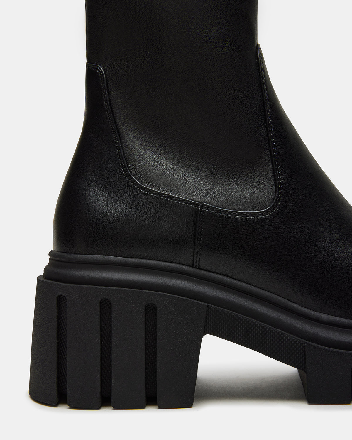 BOOMBA Black Lug Sole Ankle Boot | Women's Booties | Steve Madden Trending
