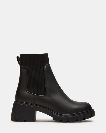 HUTCHH20 Black Water-Resistant Lug Sole Ankle Boot | Women's Booties | Steve Madden Best Seller