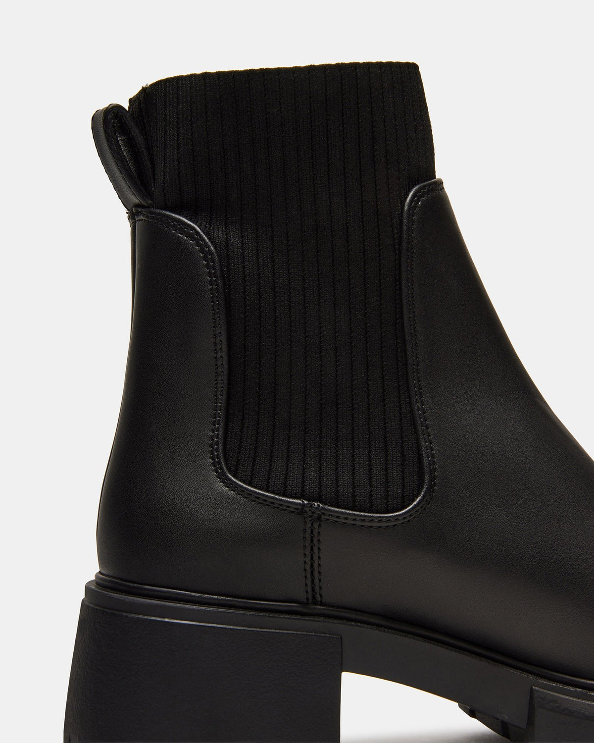 HUTCHH20 Black Water-Resistant Lug Sole Ankle Boot | Women's Booties | Steve Madden Best Seller