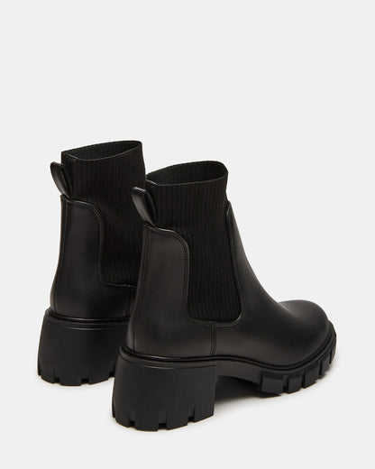 HUTCHH20 Black Water-Resistant Lug Sole Ankle Boot | Women's Booties | Steve Madden Best Seller