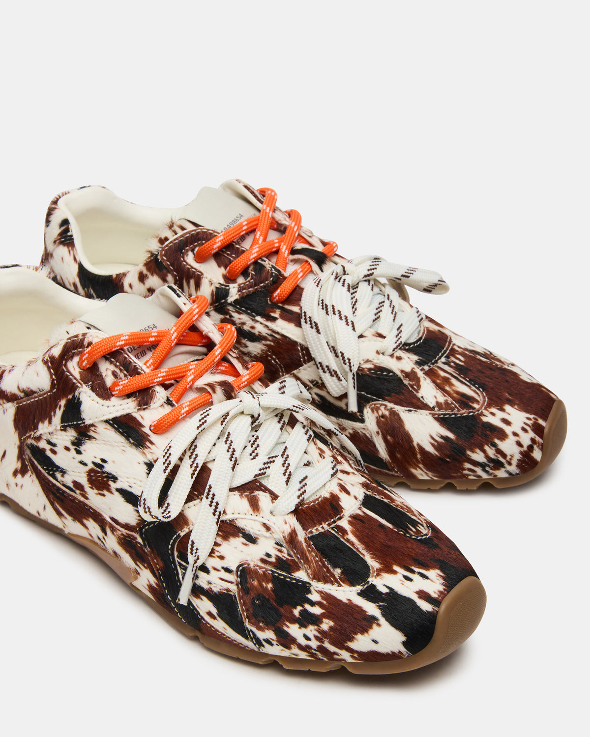 AZIEL Brown Cow Print Low-Top Lace-Up Women's Sneakers | Steve Madden Best Seller