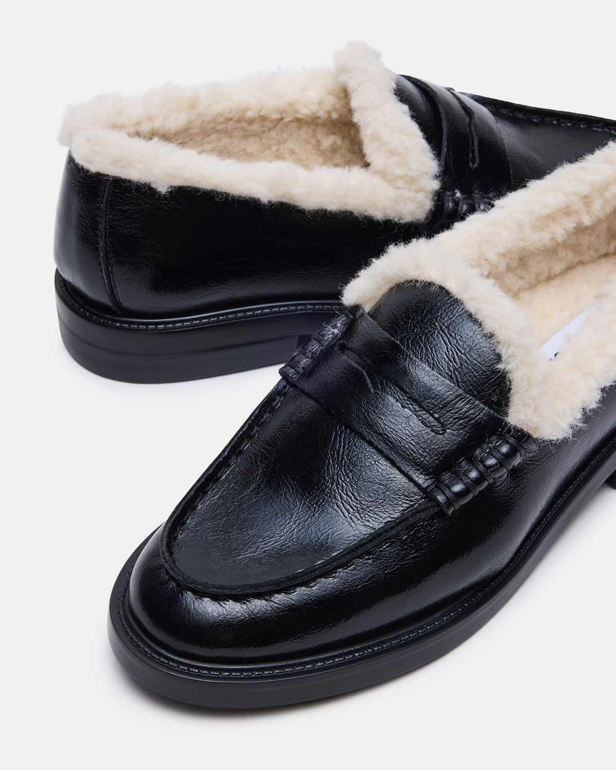 MADISON Faux Fur Black Leather Women's Penny Loafer | Steve Madden New