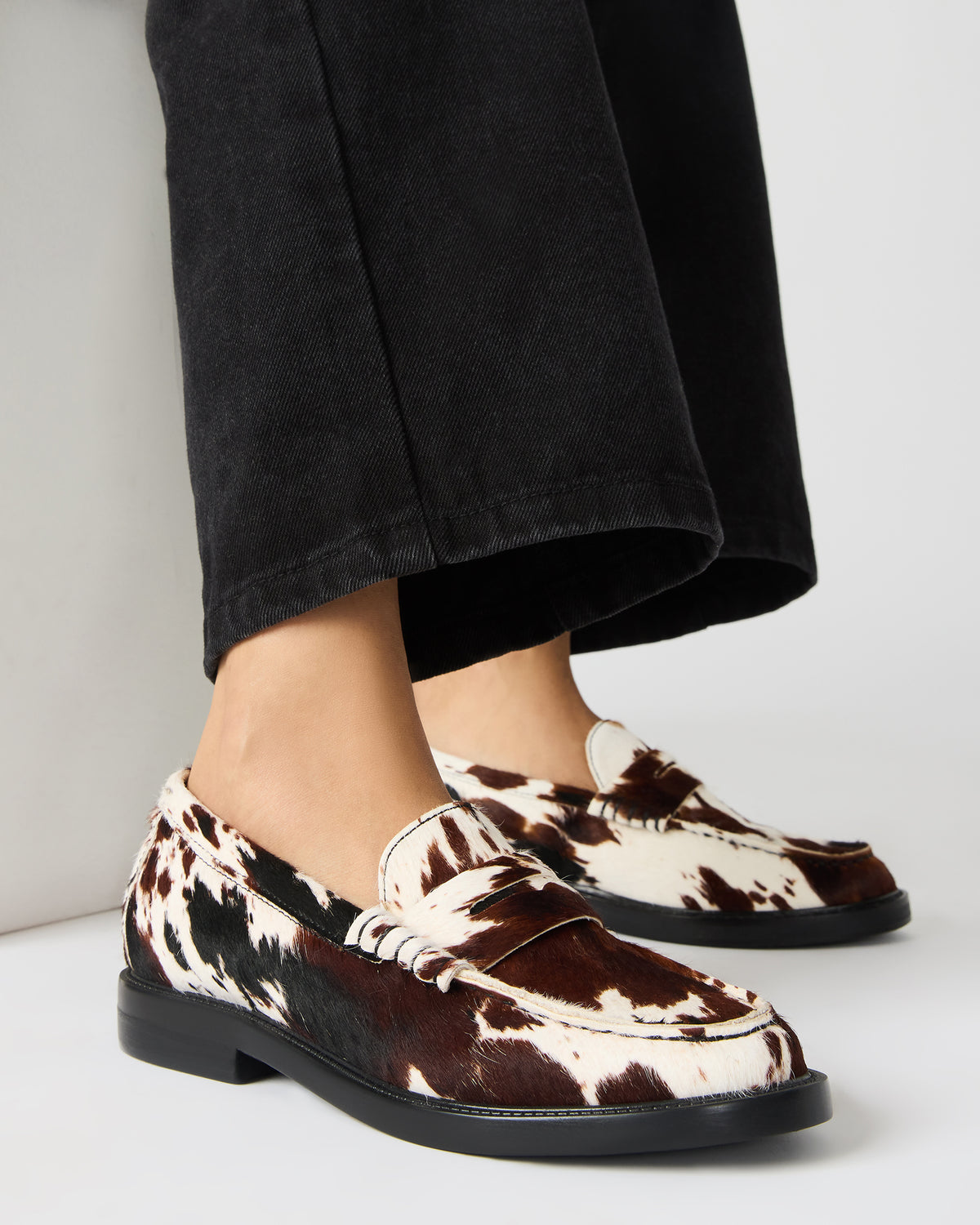 MADISON Brown Cow Print Women's Penny Loafer | Steve Madden Latest