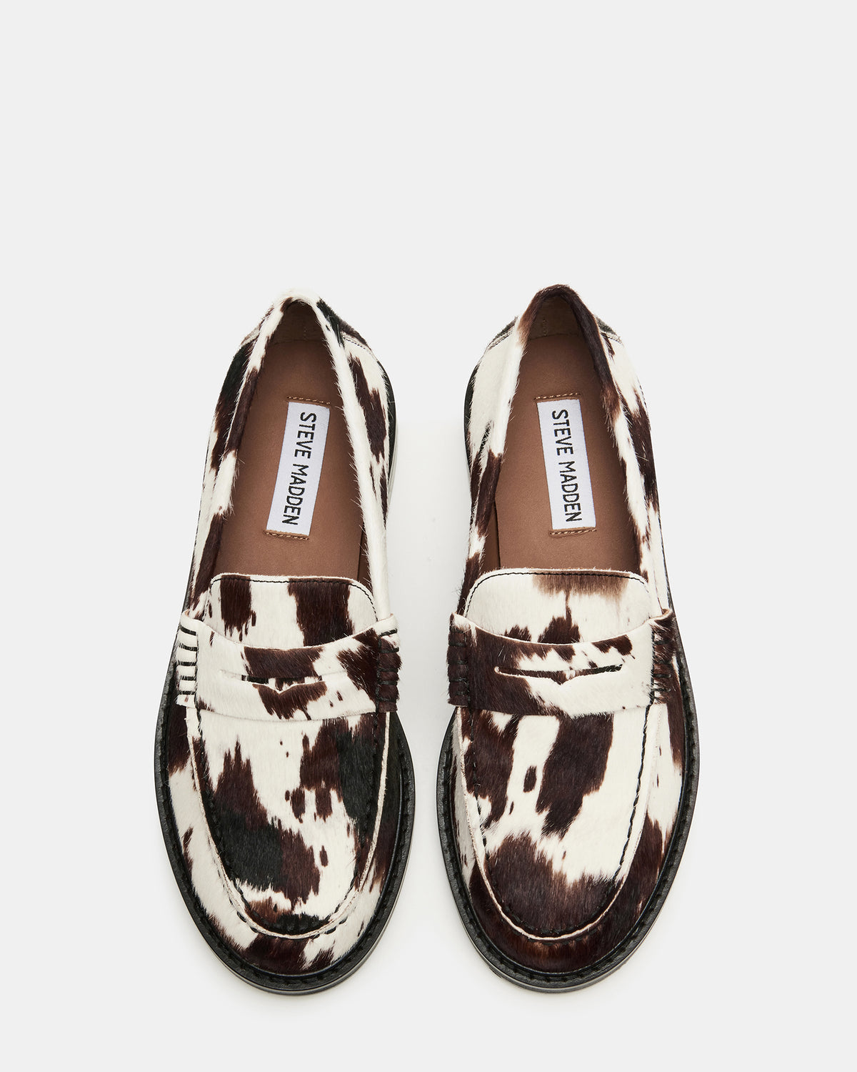 MADISON Brown Cow Print Women's Penny Loafer | Steve Madden Latest