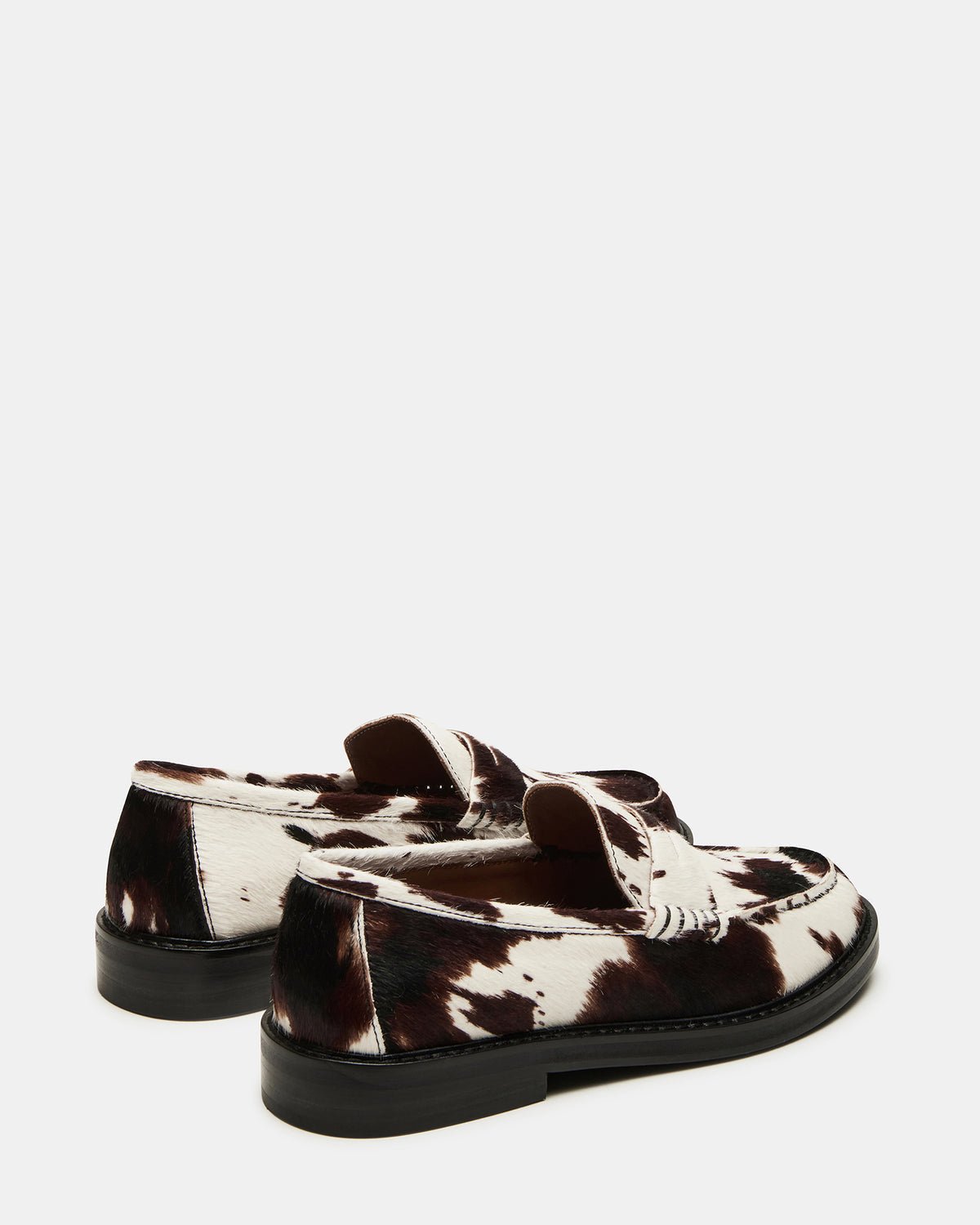 MADISON Brown Cow Print Women's Penny Loafer | Steve Madden Latest