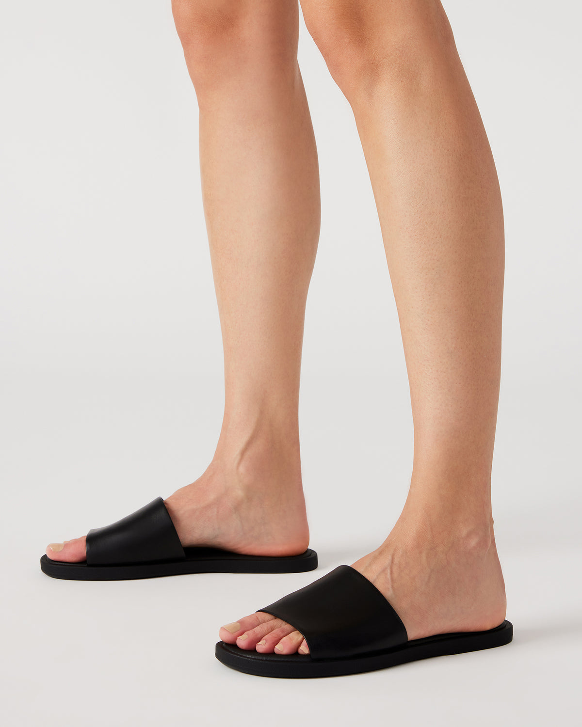 KAYA Black Leather Slide Sandal | Women's Sandals | Steve Madden Deals