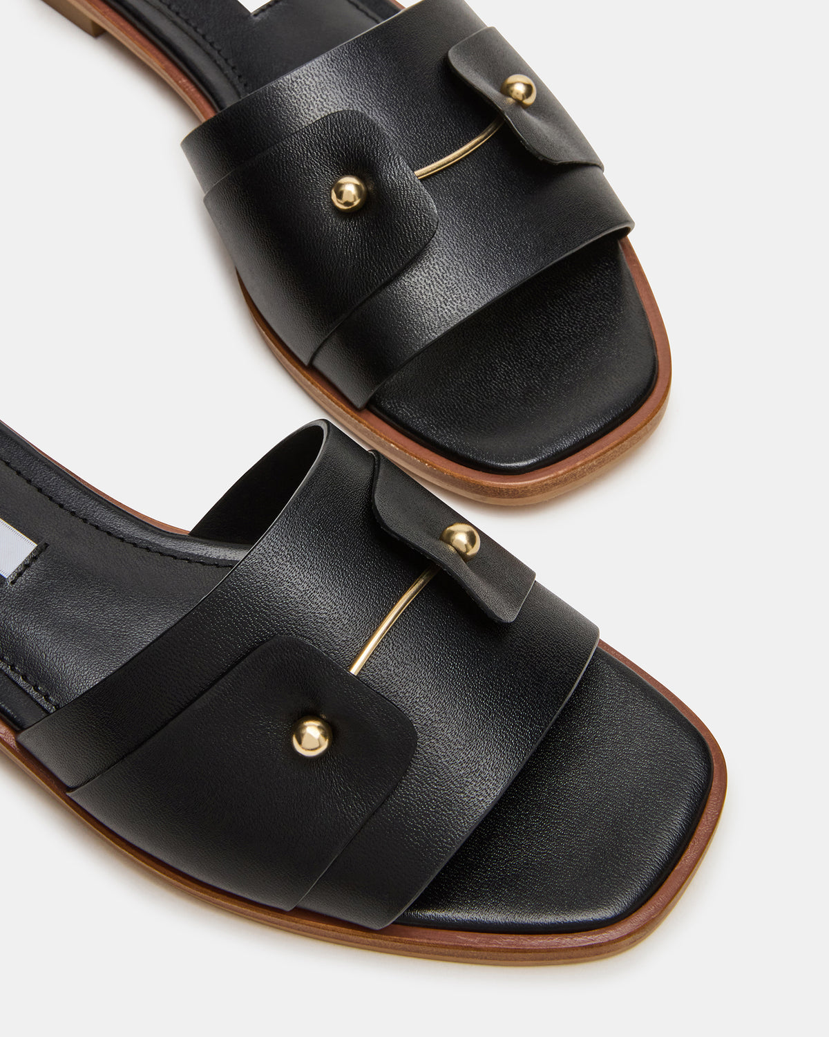 HASTEN Black Leather Gold Detail Slide Women's Sandal | Steve Madden Customer Favorite