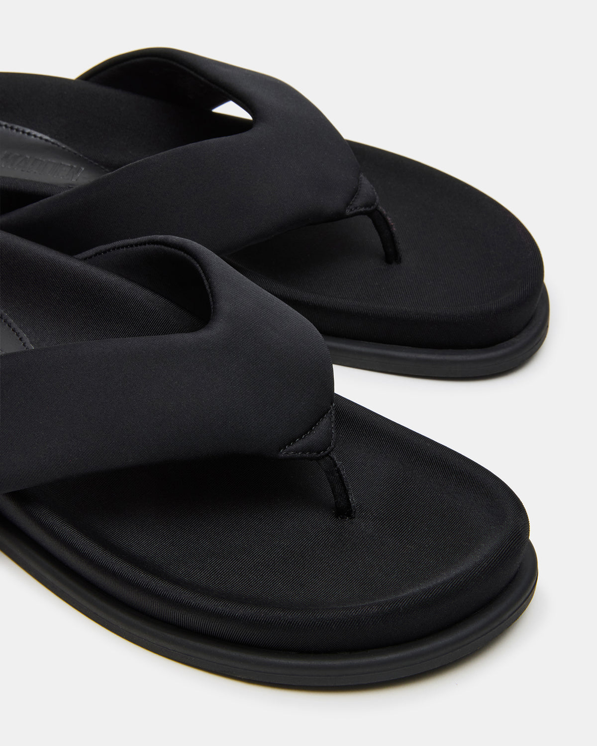 ZINNIA Black Women's Thong Footbed Sandal | Steve Madden Exclusive