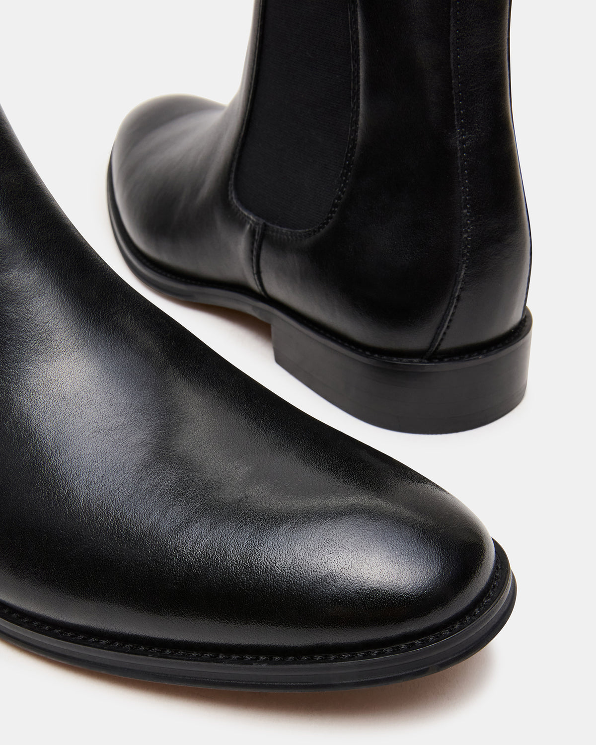 ALDAIR Black Chelsea Men's Ankle Boot | Steve Madden Featured