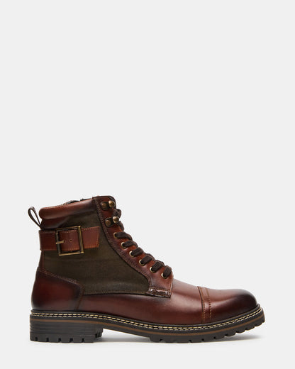 REID Cognac Lace-Up Lug Men's Ankle Boot | Steve Madden Customer Favorite