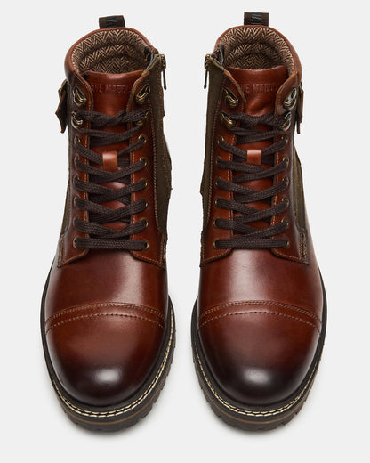 REID Cognac Lace-Up Lug Men's Ankle Boot | Steve Madden Customer Favorite