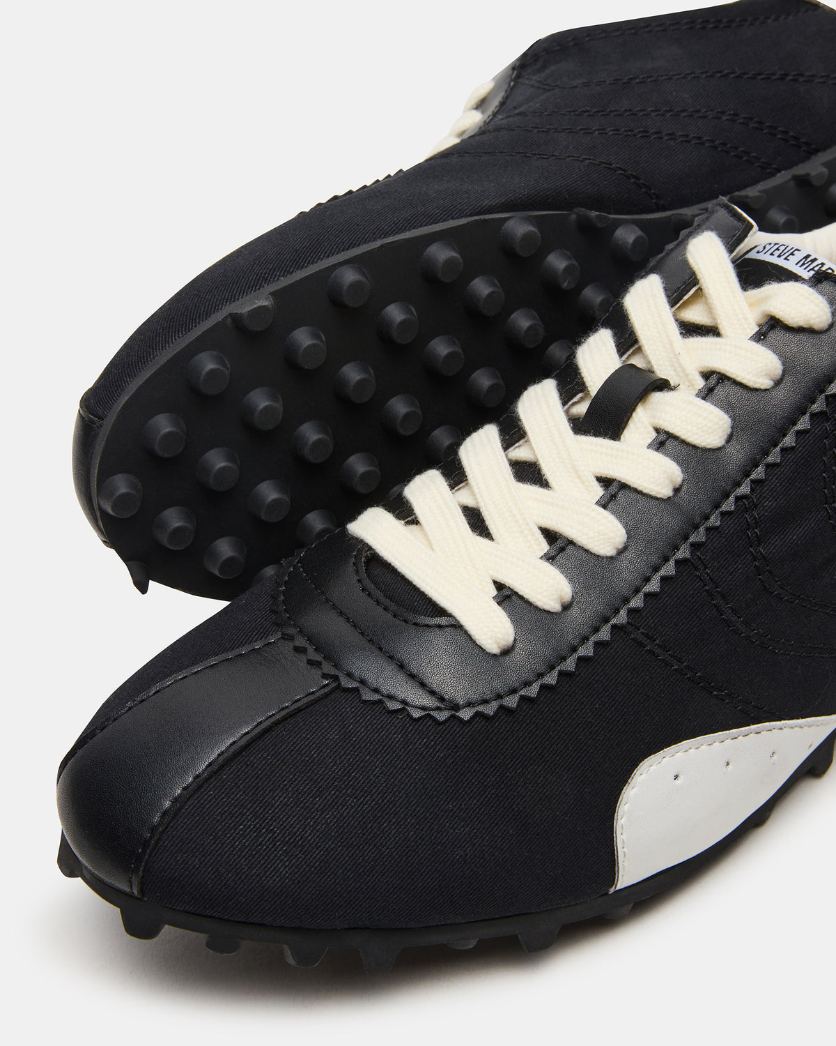 PUZZLE Black Low-Top Lace-Up Men's Sneaker | Steve Madden Sale