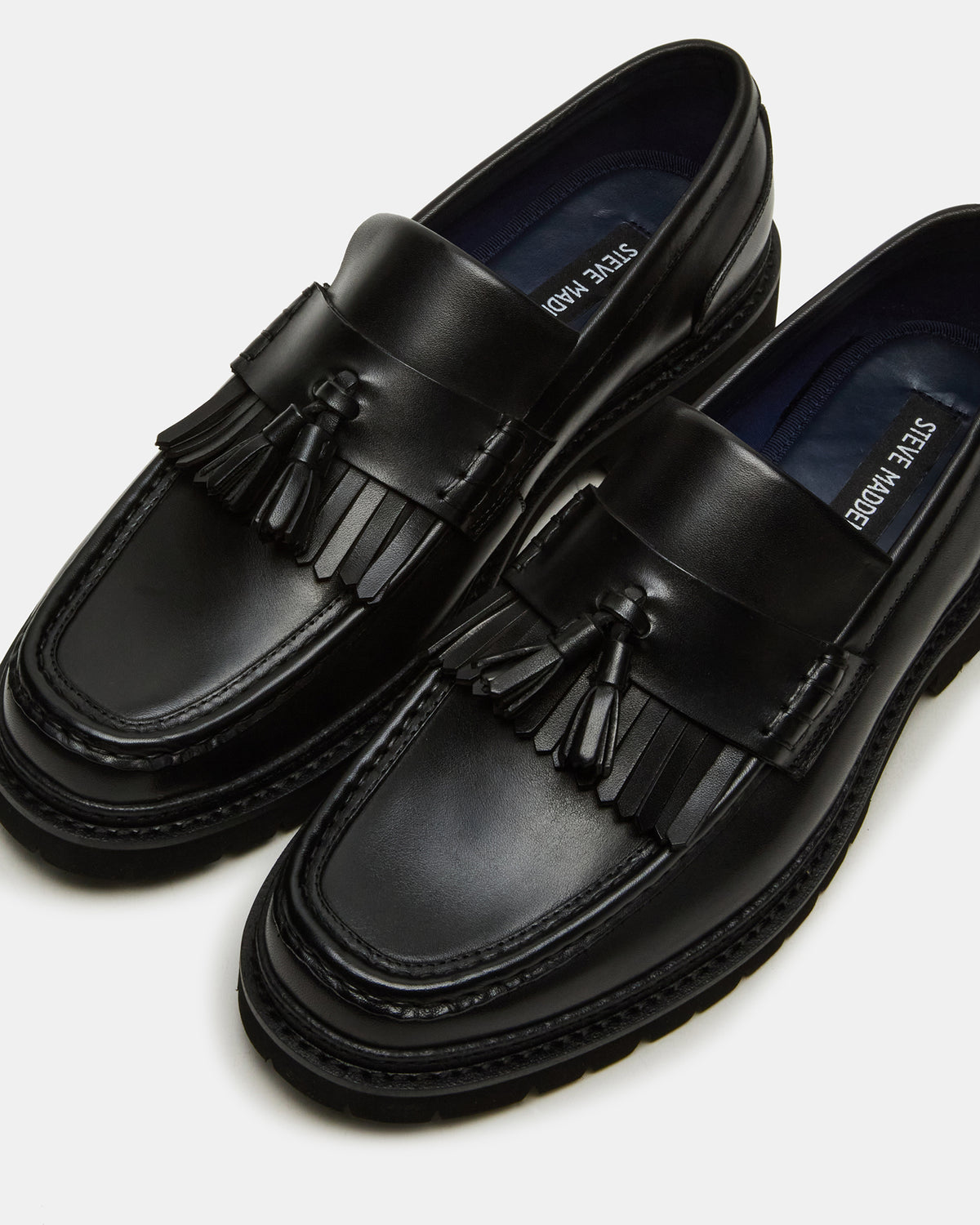 ARTHUS Black Leather Slip-On Tassel Men's Loafer | Steve Madden Classic
