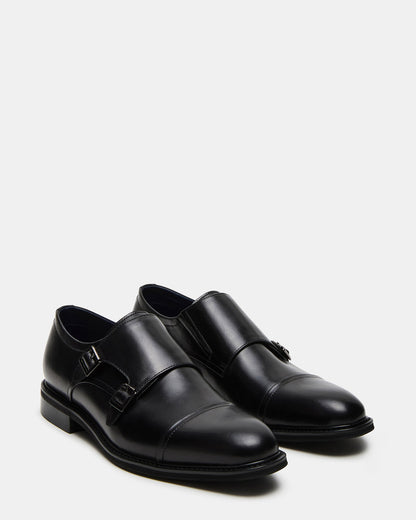 HARAN Black Leather Men's Buckle Strap Dress Shoe | Steve Madden Trusted