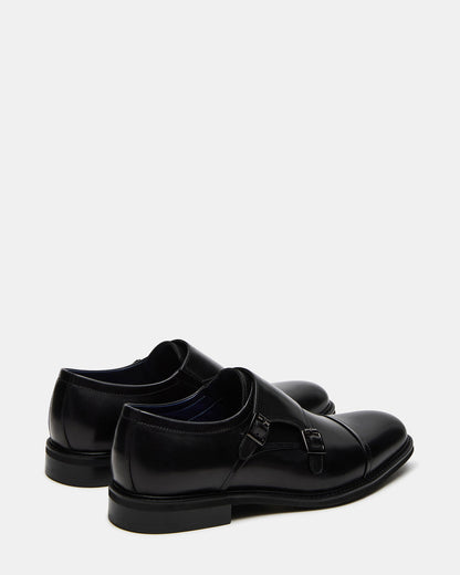 HARAN Black Leather Men's Buckle Strap Dress Shoe | Steve Madden Trusted