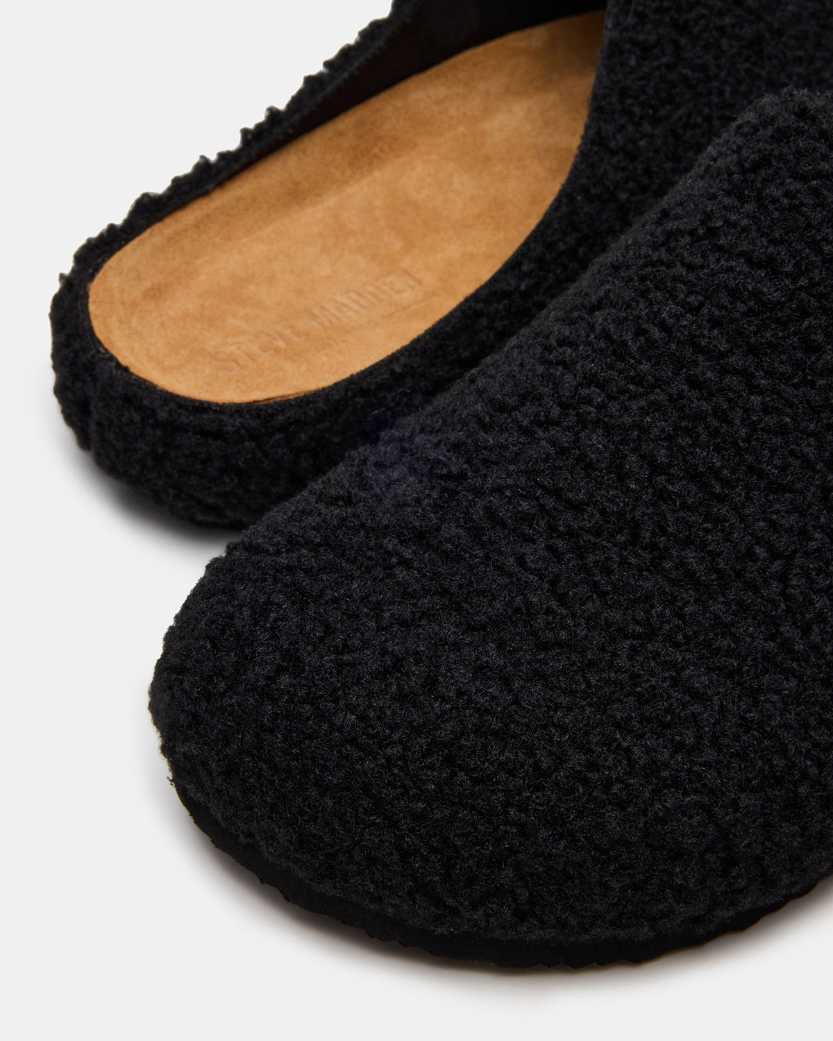 WENDELIN Black Faux Shearling Footbed Slip-On Men's Casual Clog | Steve Madden Trusted