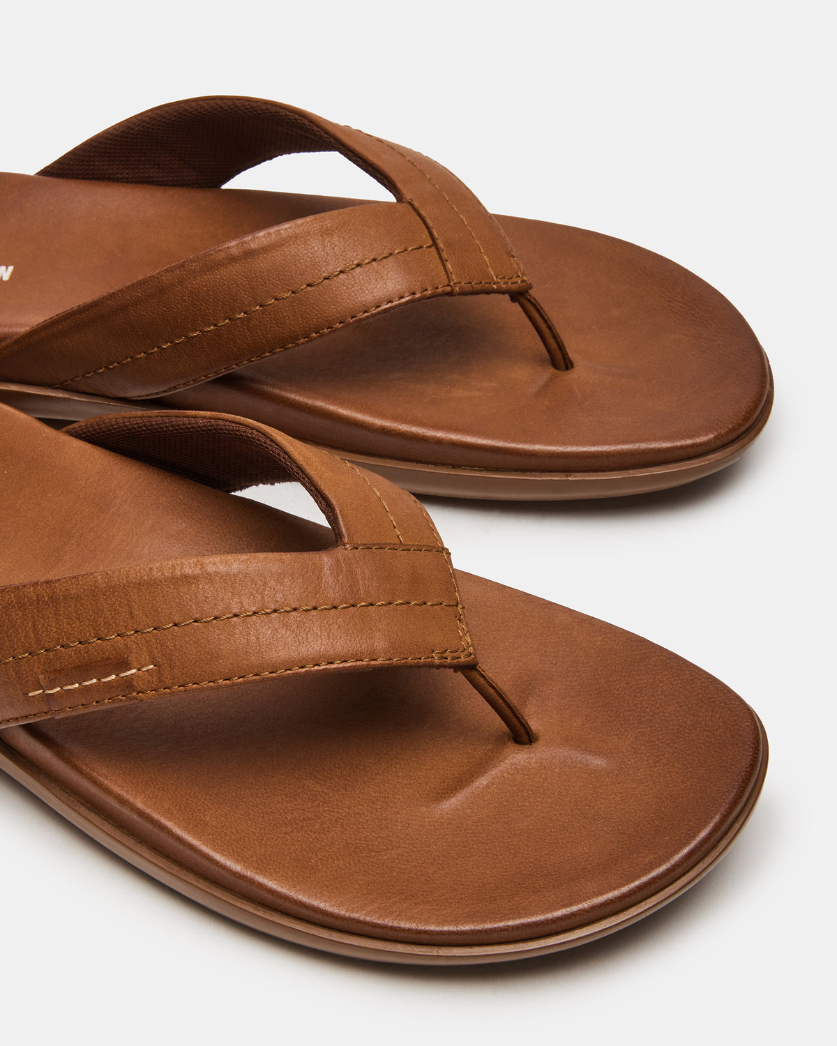 EMMETT Tan Leather Men's Thong Sandal | Steve Madden Smart Buy