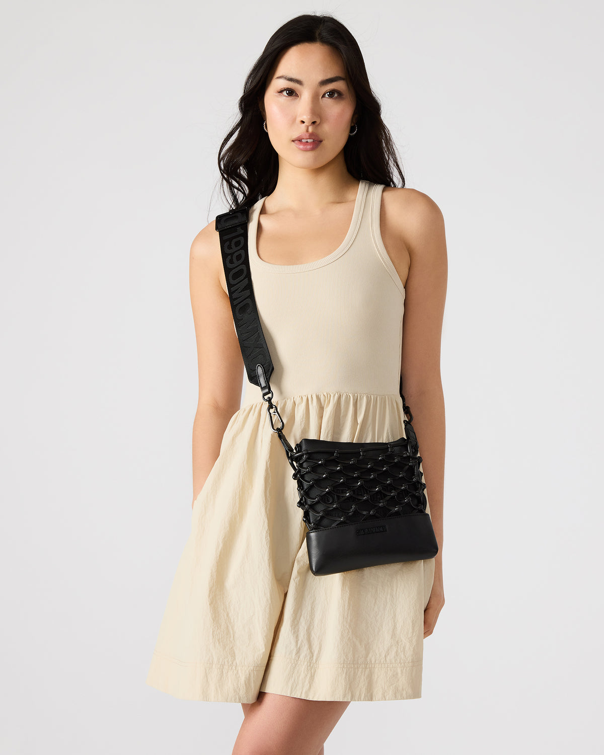 ARDA Black/Black Women's Crossbody Pouch Handbag | Steve Madden Trending