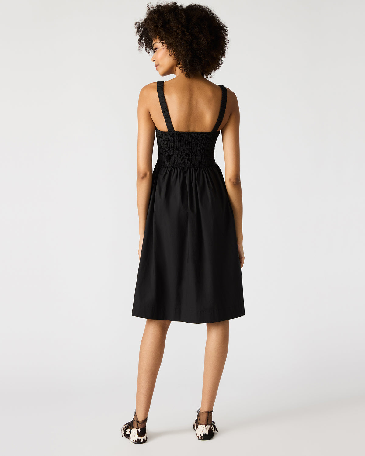 FLEUR Black Flowy Smocked Midi Women's Dress | Steve Madden Great Value