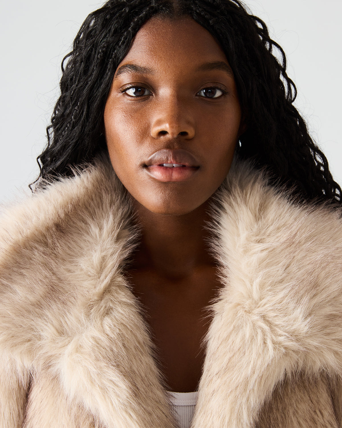 SAFIRA Natural Faux Fur Sleeveless Collared Women's Vest | Steve Madden Smart Buy