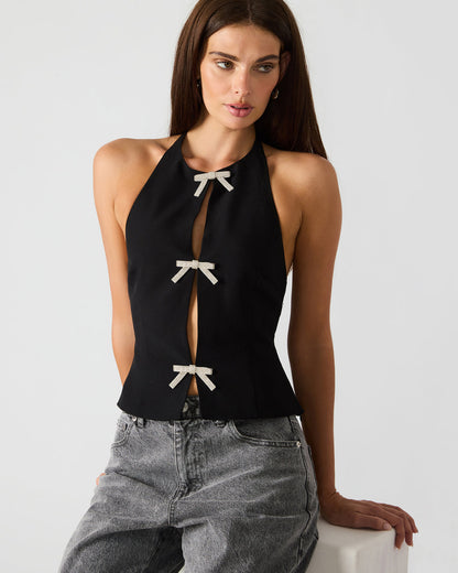 JUVIA Black Sleeveless Bow Detail Halter Women's Top | Steve Madden Great Value