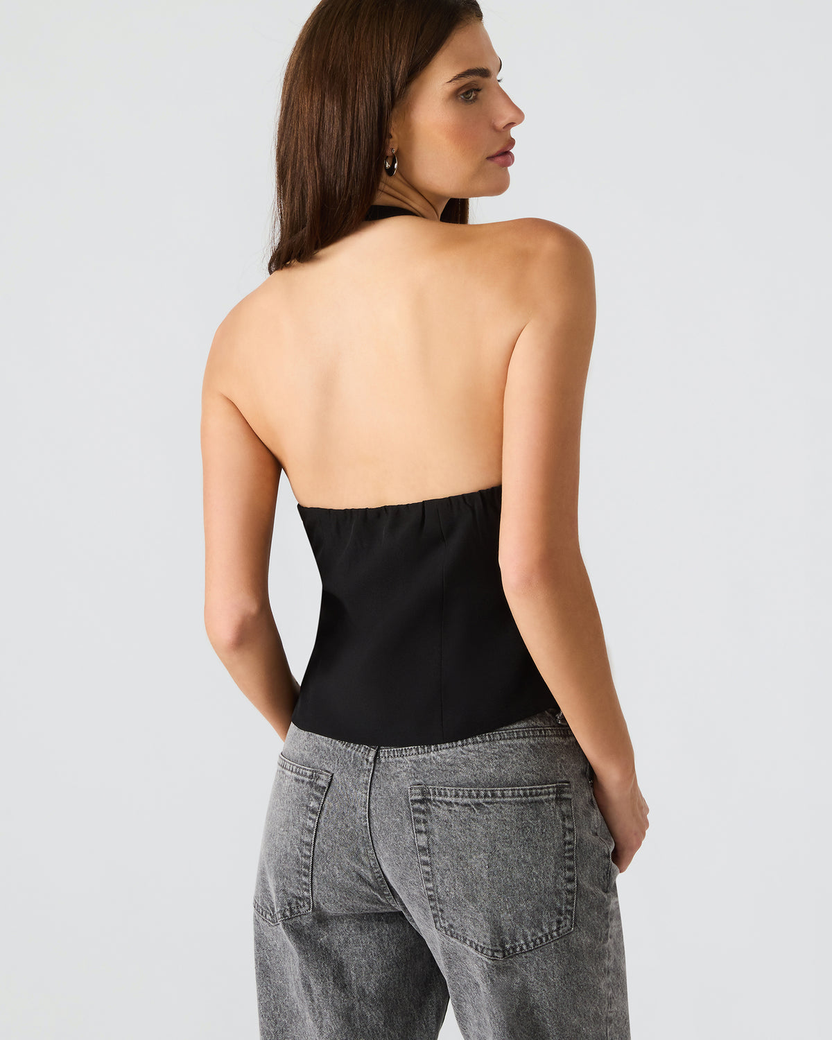 JUVIA Black Sleeveless Bow Detail Halter Women's Top | Steve Madden Great Value