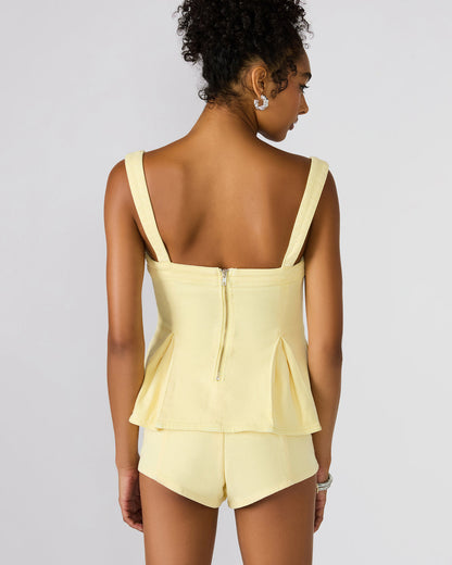 ZENIA Golden Glow Sleeveless Peplum Women's Top | Steve Madden Value